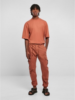 Мъжки карго панталон в цвят праскова Urban Classics Cargo Jogging Pants 