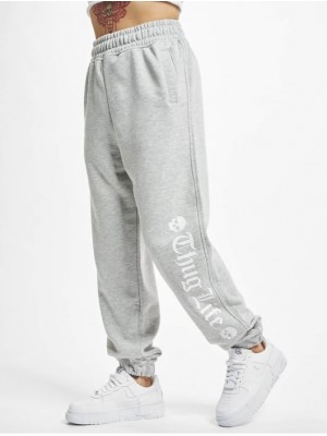 Дамско широко долнище в светлосив цвят Thug Life Grea