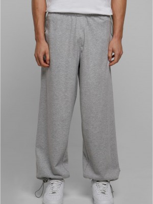 Мъжко долнище в сив цвят с парашутна кройка Urban Classics Parachute Мъжко долнище в сив цвят с парашутна кройка Urban Classics Parachute